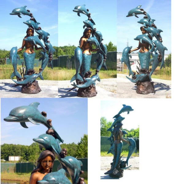 Mermaid Swimming With 8 Dolphins